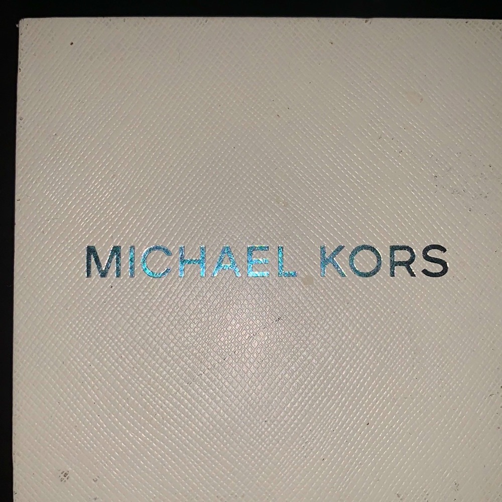 Selling a gold Michael Kors watch